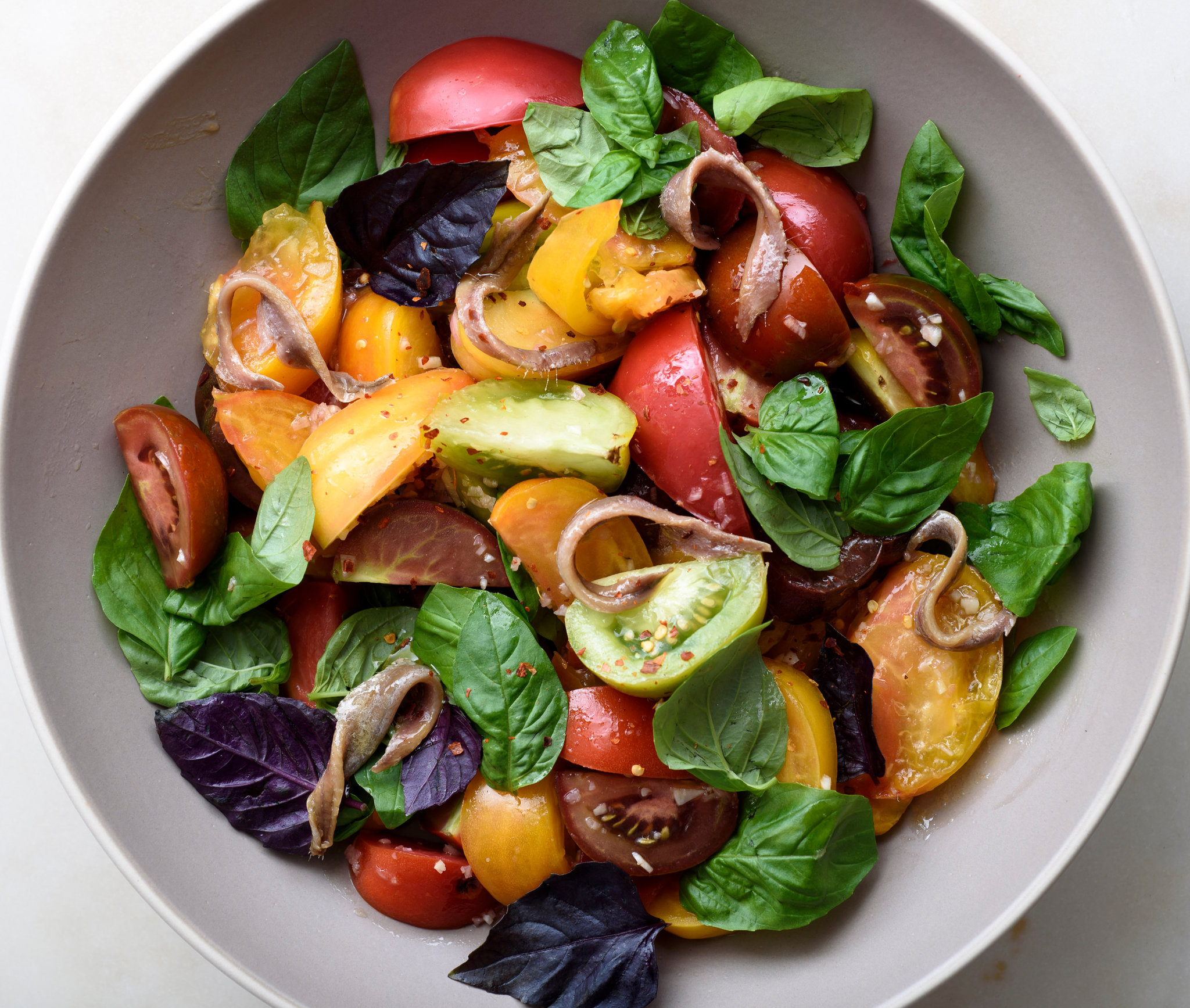 Tomatoes with basil and anchovies.png